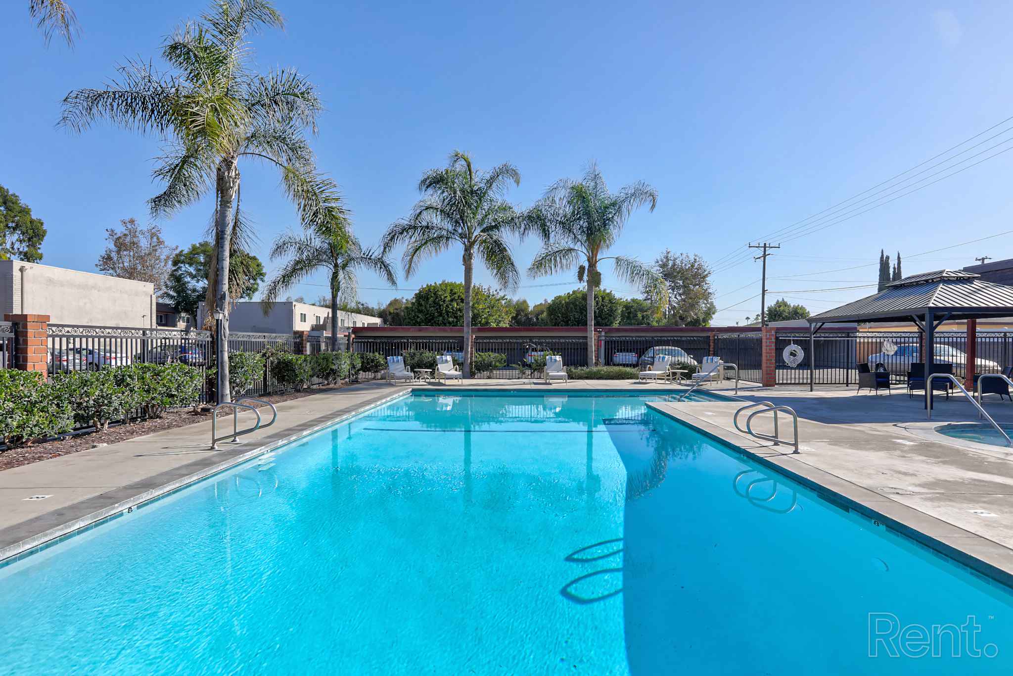 Beautiful community pool at Chateau de Ville Apartments