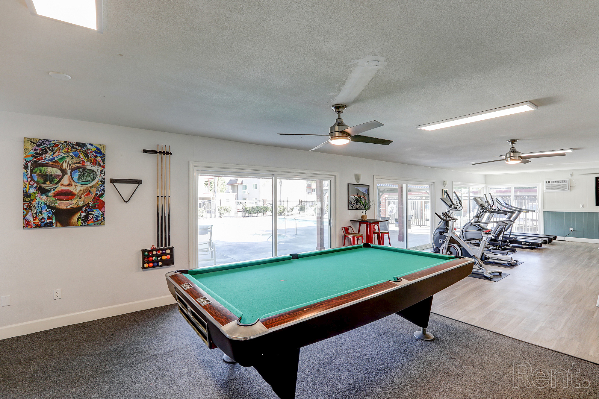 Chateau deville apartment community rec room with pool table